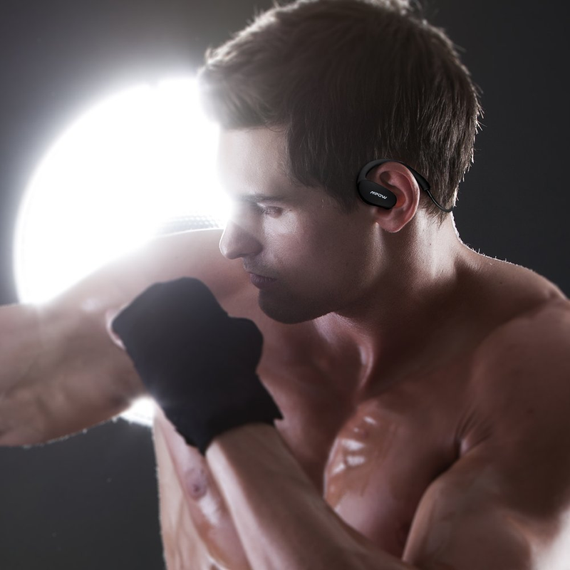 Illustration for article titled The wonderful world of cheap bluetooth headphones photoshopped onto stock photos of people exercising